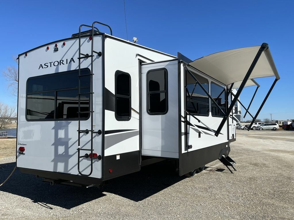 Side view of the New 2022 Dutchmen Astoria Platinum 3553MBP Fifth Wheel RV.