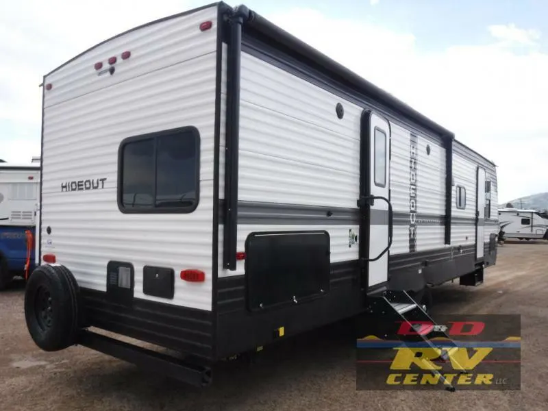 Side view of the New 2022 Keystone Rv Hideout 29DFS Travel Trailer RV.