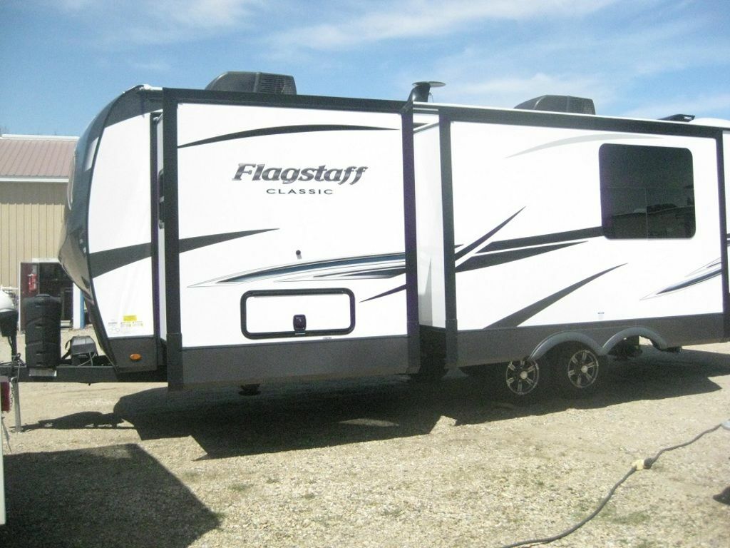 Side view of the New 2022 Forest River Flagstaff Classic 826RBS Travel Trailer RV.