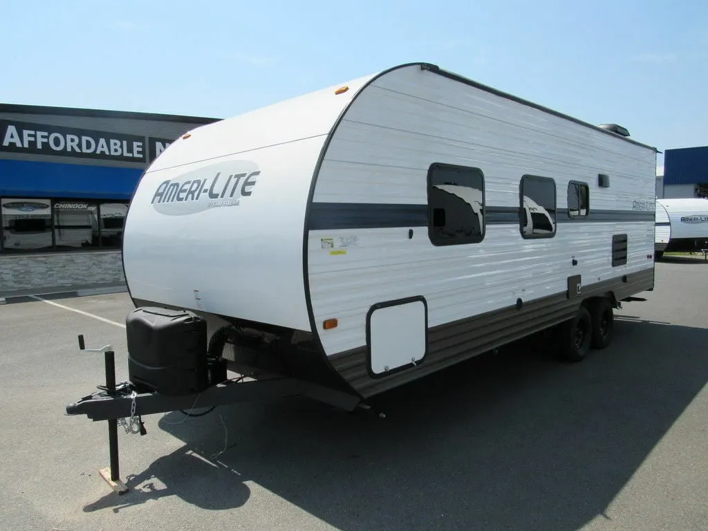 Side view of the New 2022 Gulf Stream Amerilite 241RB Travel Trailer RV.