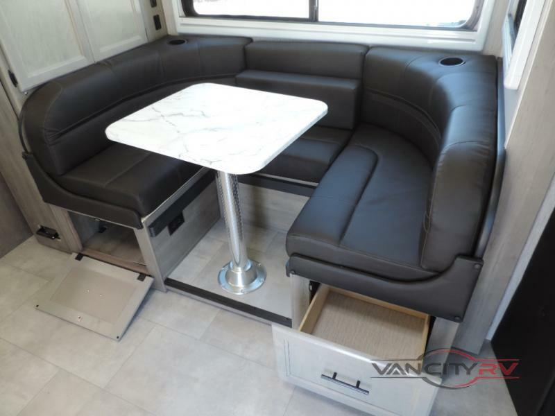 Dinette with pull-out storage drawers.