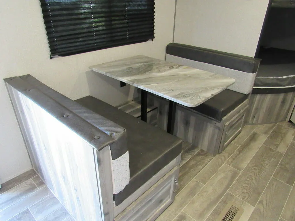 Dinette with pull-out storage drawers.