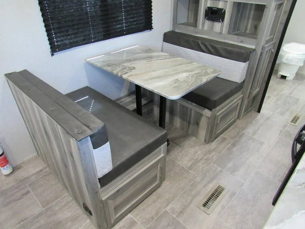 Dinette with pull-out storage drawers.