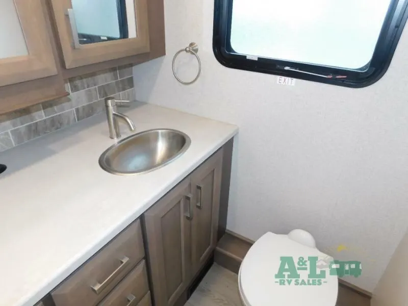 Bathroom with a sink and a toilet.