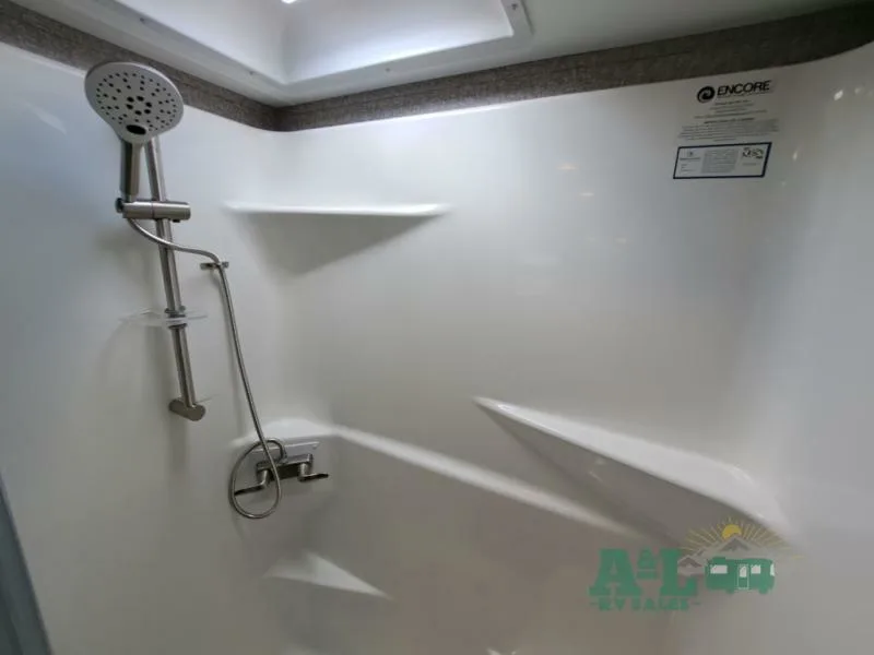 Walk-in shower with skylight.