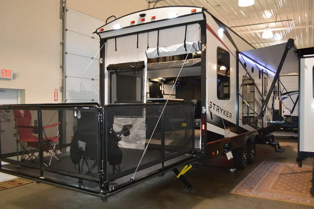 Rear view of the New 2022 Cruiser Rv Stryker ST2916 Travel Trailer Toy Hauler RV.