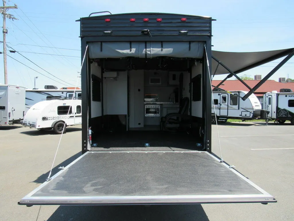 Rear view of the New 2022 Chinook Travel Trailer RPM Extreme 18FKLE Toy Hauler RV.