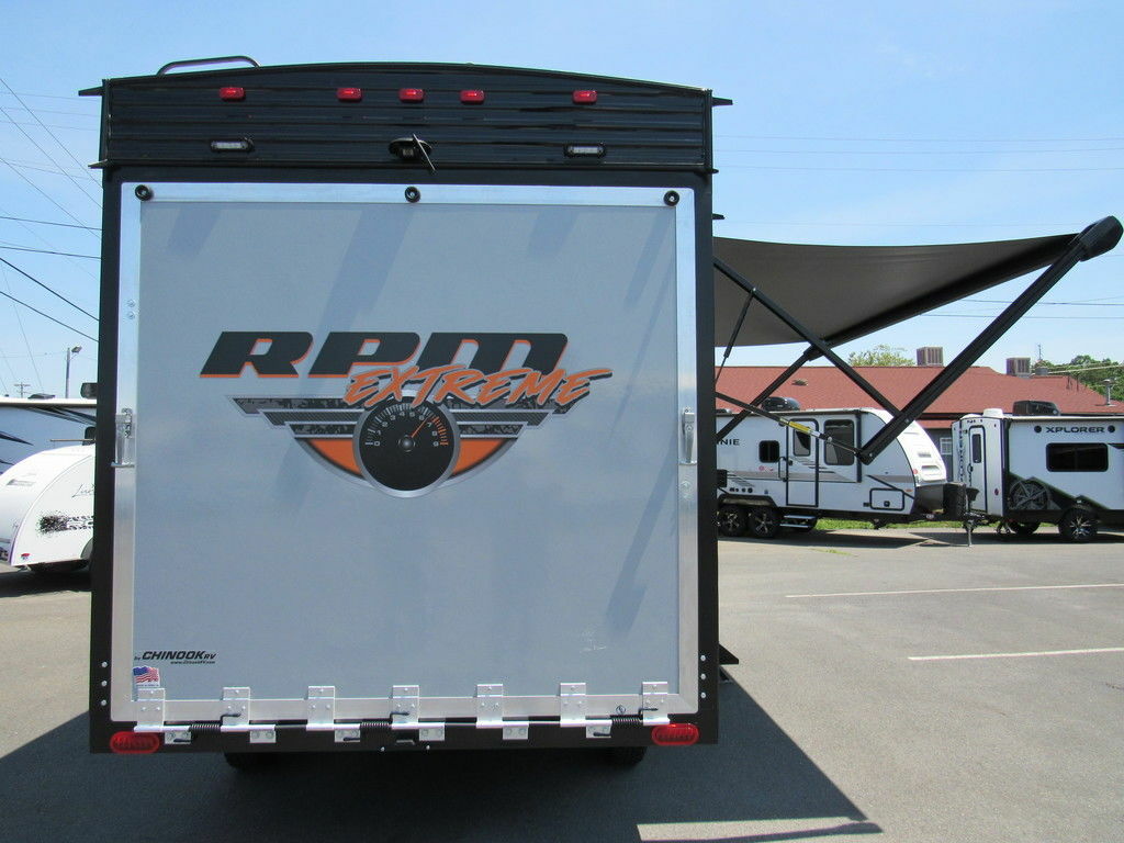 Rear view of the New 2022 Chinook Travel Trailer RPM Extreme 18FKLE Toy Hauler RV.