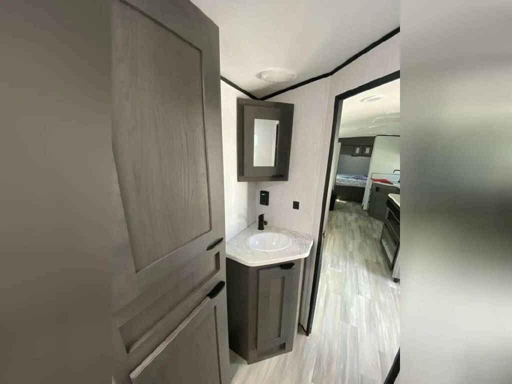 Bathroom with a sink and a linen.