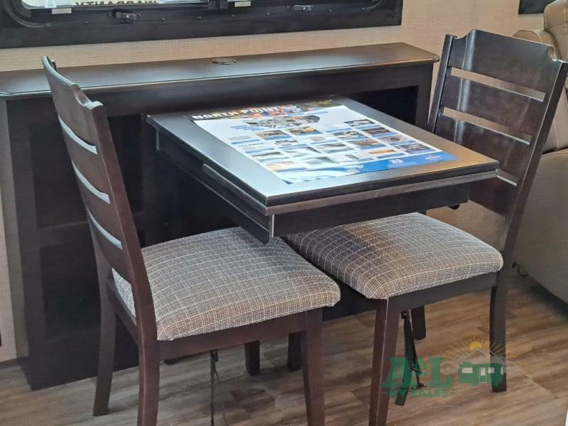 Dinette with wood table and chairs.