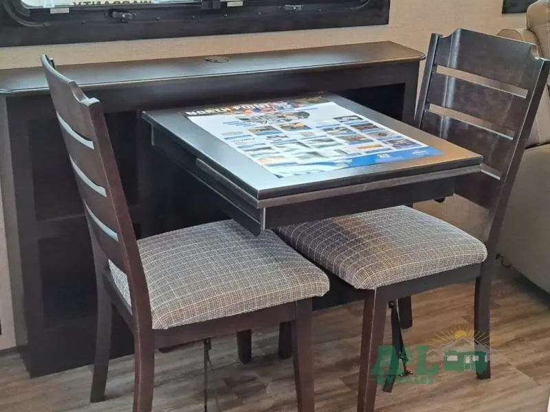 Dinette with wood table and chairs.