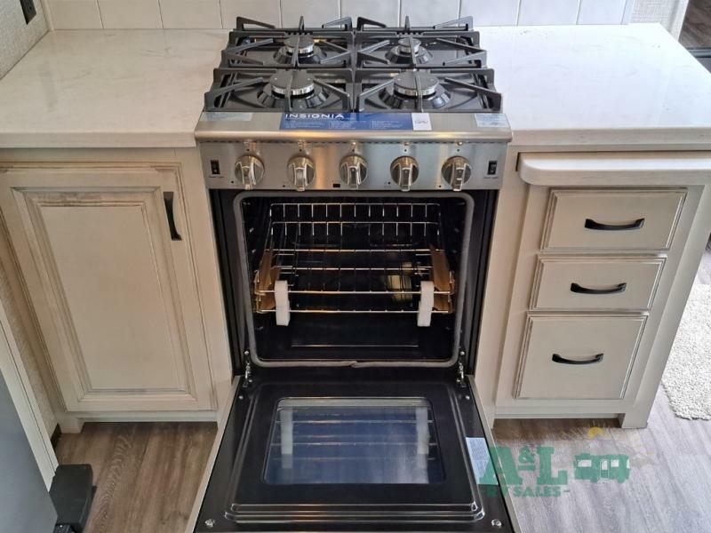 Stove and oven in a kitchen.