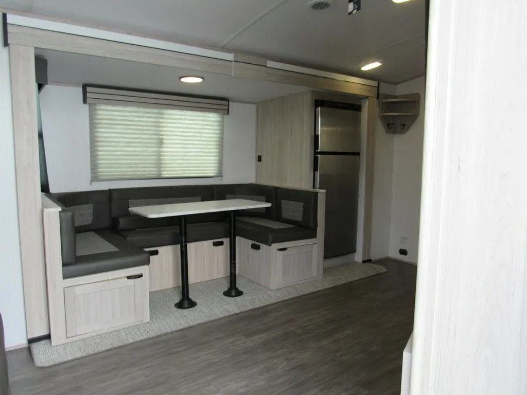 Dinette with pull-out storage drawers.