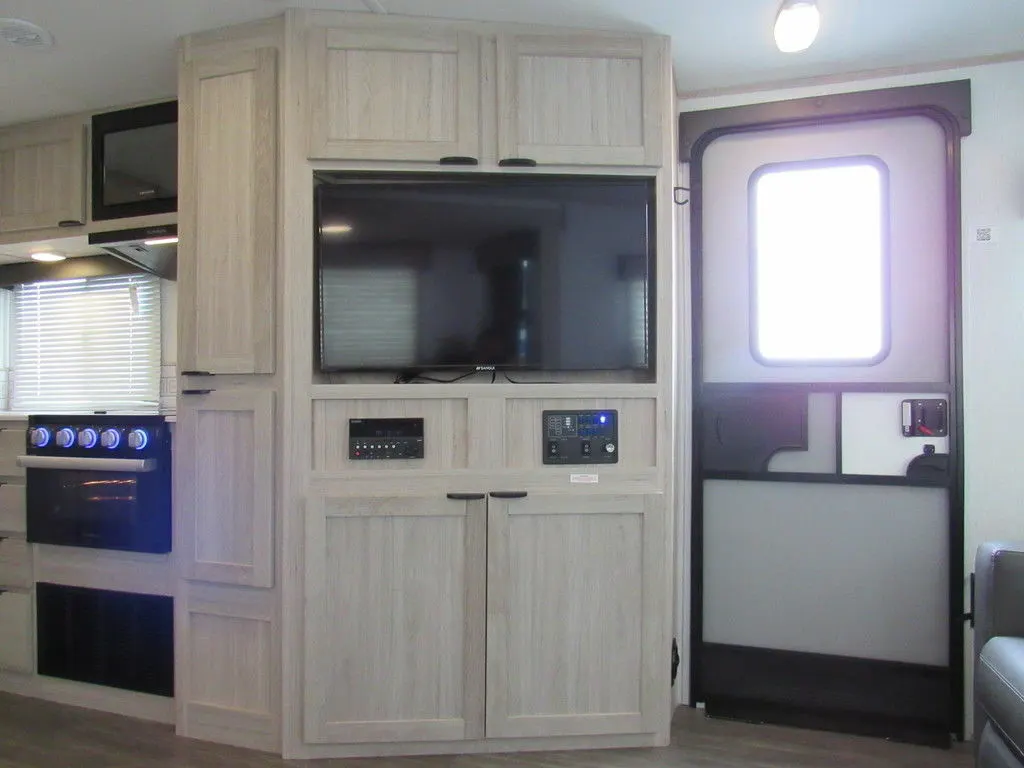 Entertainment center with a TV.