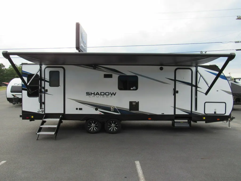 Side view of the RV with awning.