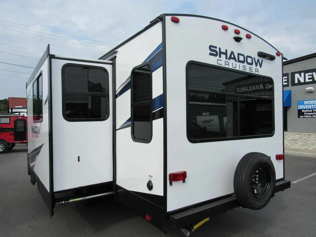 Rear view of the RV with slide out.