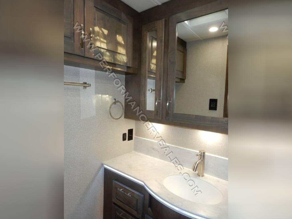 Bathroom with a sink and cabinets.