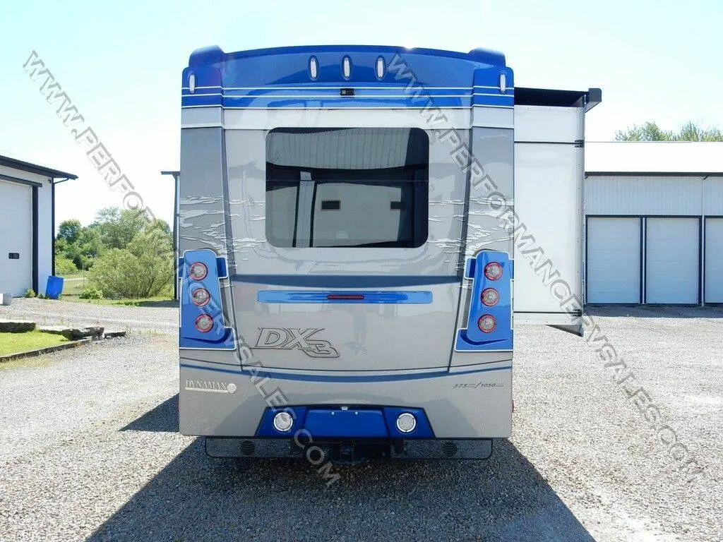 Rear view of the New 2025 Dynamax DX3 37BD Class C RV.