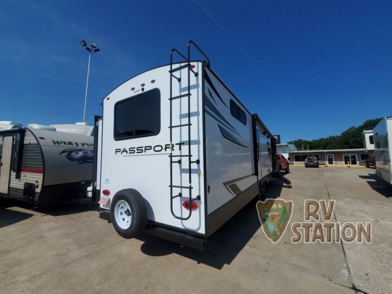 Rear view of the New 2022 Keystone Rv Passport GT 3401QD Travel Trailer RV.