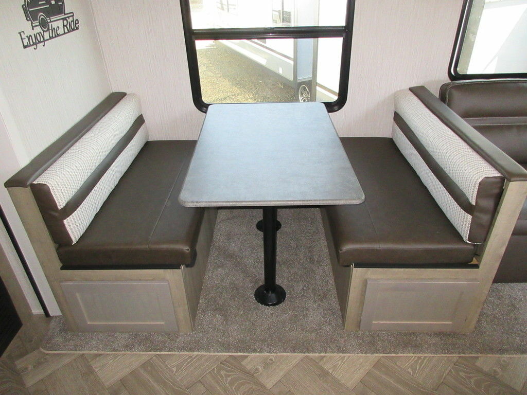 Dinette with pull-out storage drawers.