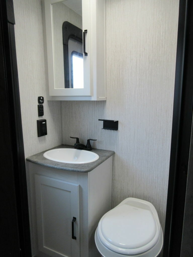 Bathroom with a sink and toilet.