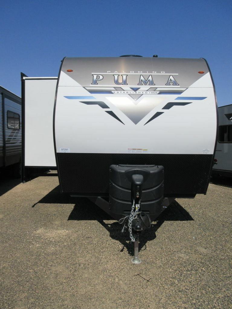 Front view of the New 2022 Palomino Puma 32BHQS Travel Trailer RV.