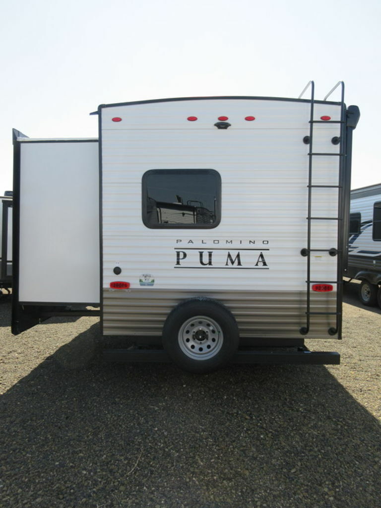 Rear view of the New 2022 Palomino Puma 32BHQS Travel Trailer RV.