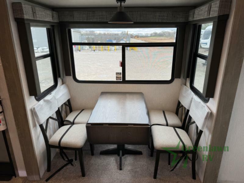 Dinette with wood table and chairs.