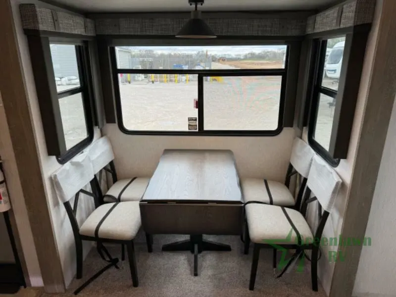 Dinette with wood table and chairs.