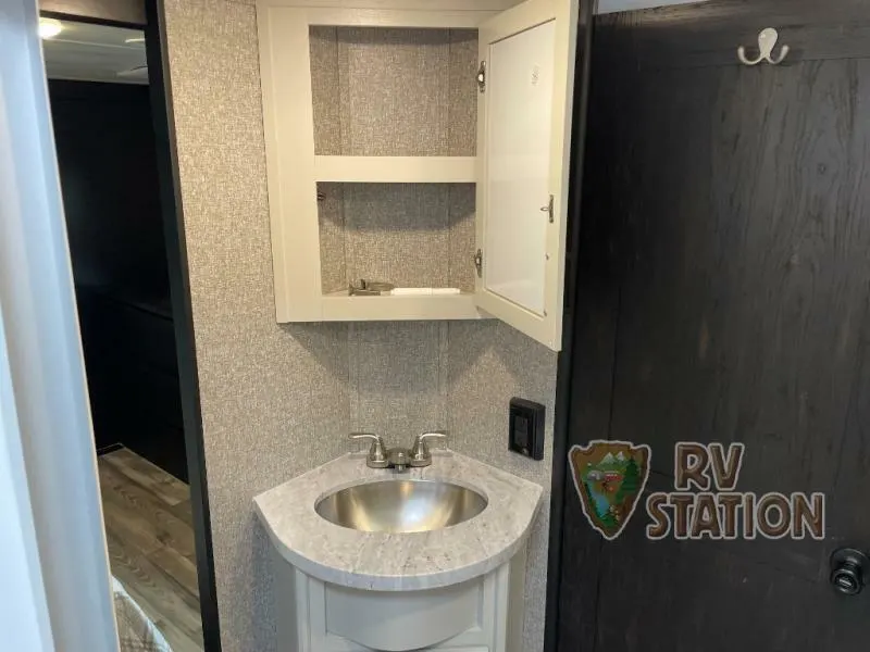 Bathroom with a sink and a medicine cabinet.