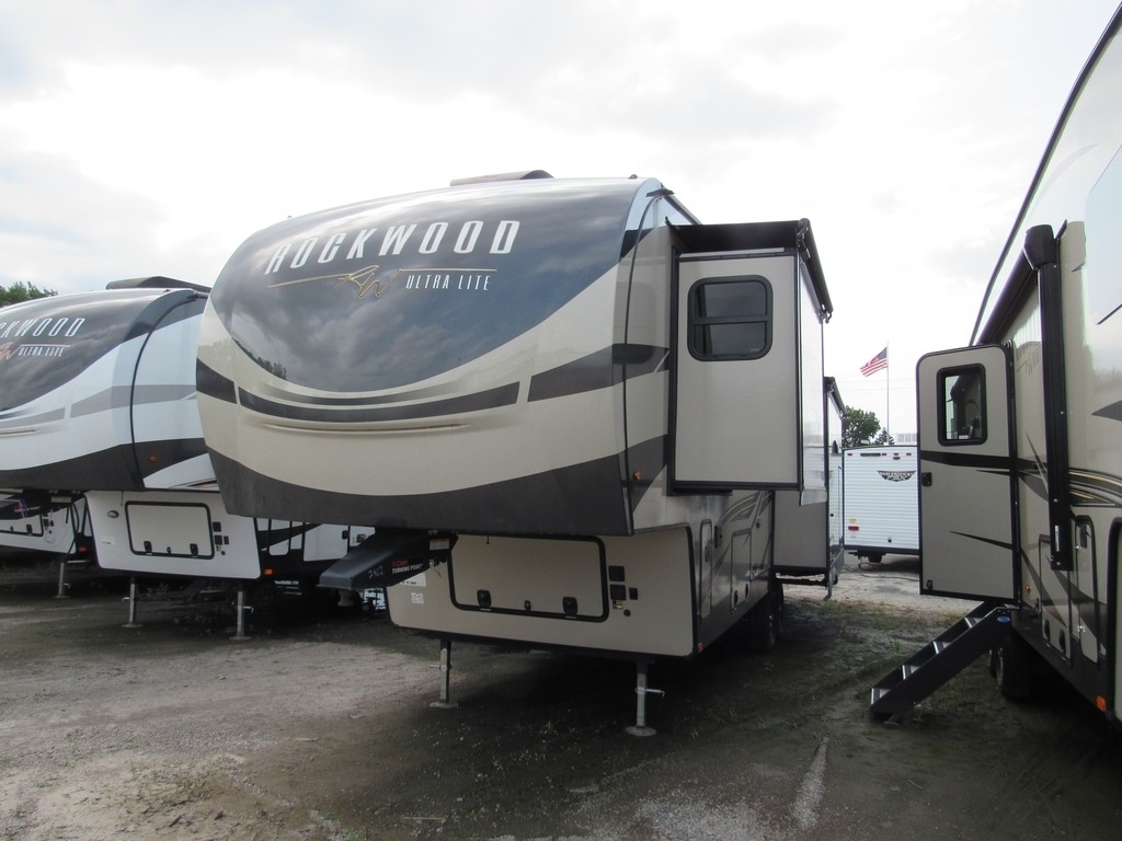 Front view of the New 2022 Forest River Rockwood Signature 2893BS Travel Trailer RV.