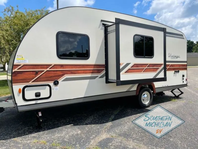 Side view of the New 2023 Gulf Stream Rv Vintage Cruiser 19CSK Travel Trailer RV.