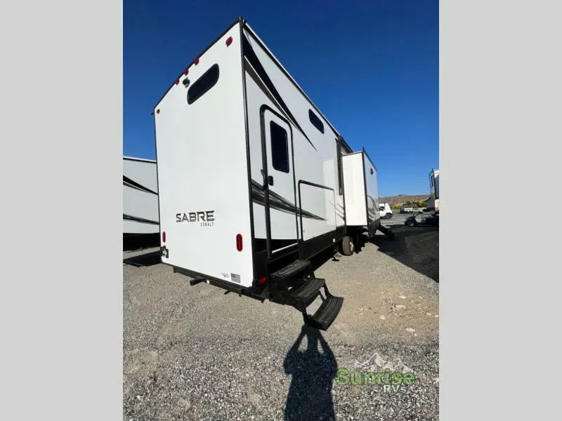 Rear view of the New 2022 Forest River Rv Sabre 38DBQ Fifth Wheel RV.