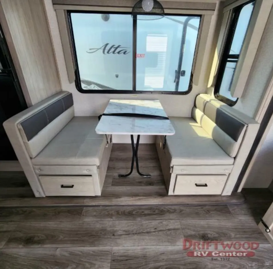 Dinette with drawers underneath the chairs.