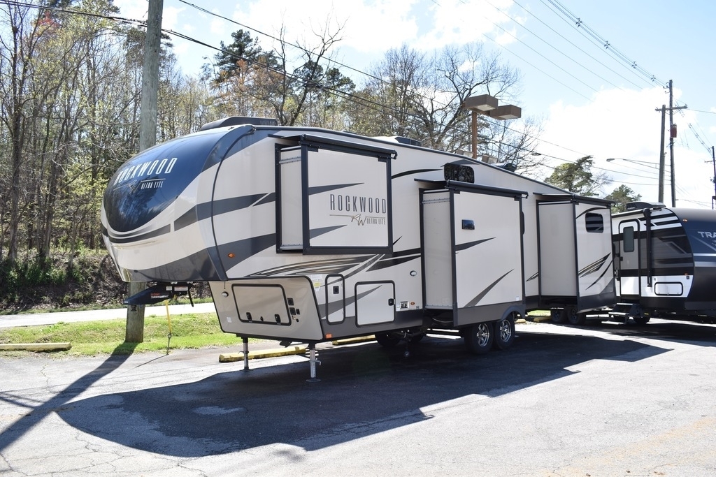 Side view of the New 2022 Forest River Rockwood Signature 2892RB Travel Trailer RV.