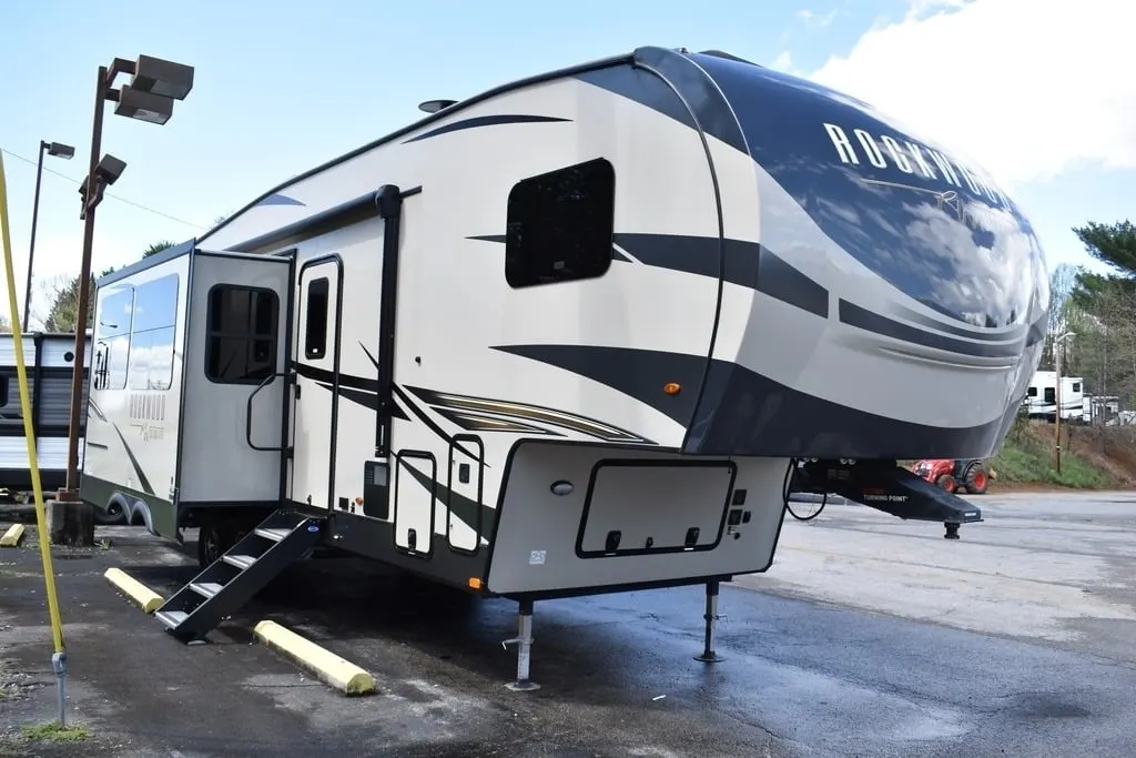 Side view of the New 2022 Forest River Rockwood Signature 2892RB Travel Trailer RV.