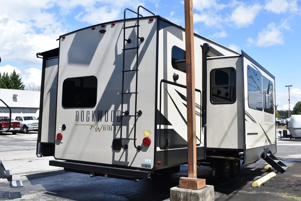 Rear view of the New 2022 Forest River Rockwood Signature 2892RB Travel Trailer RV.