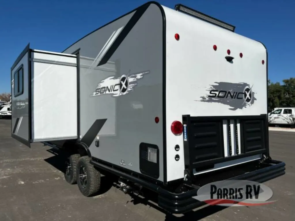 Rear view of the New 2023 Venture Rv Sonic X SN220VRBX Travel Trailer RV.