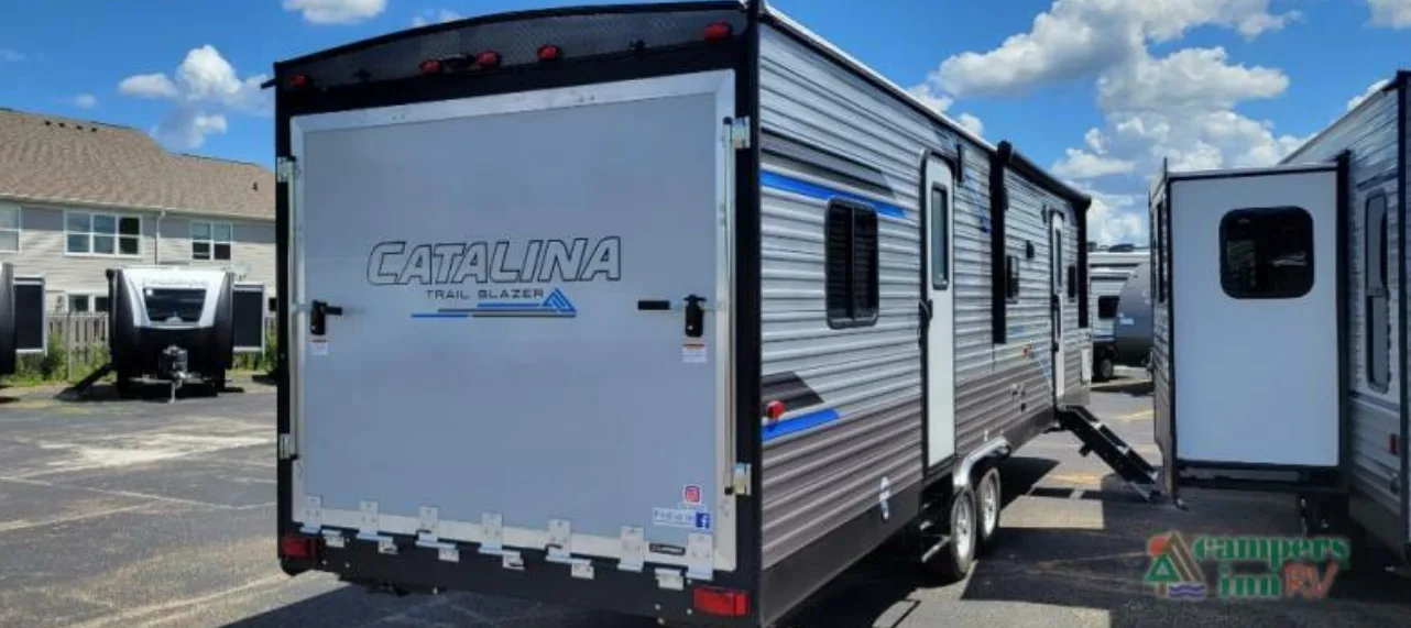 Rear view of the New 2022 Coachmen Rv Travel Trailer Catalina Trail Blazer 29THS Toy Hauler RV.