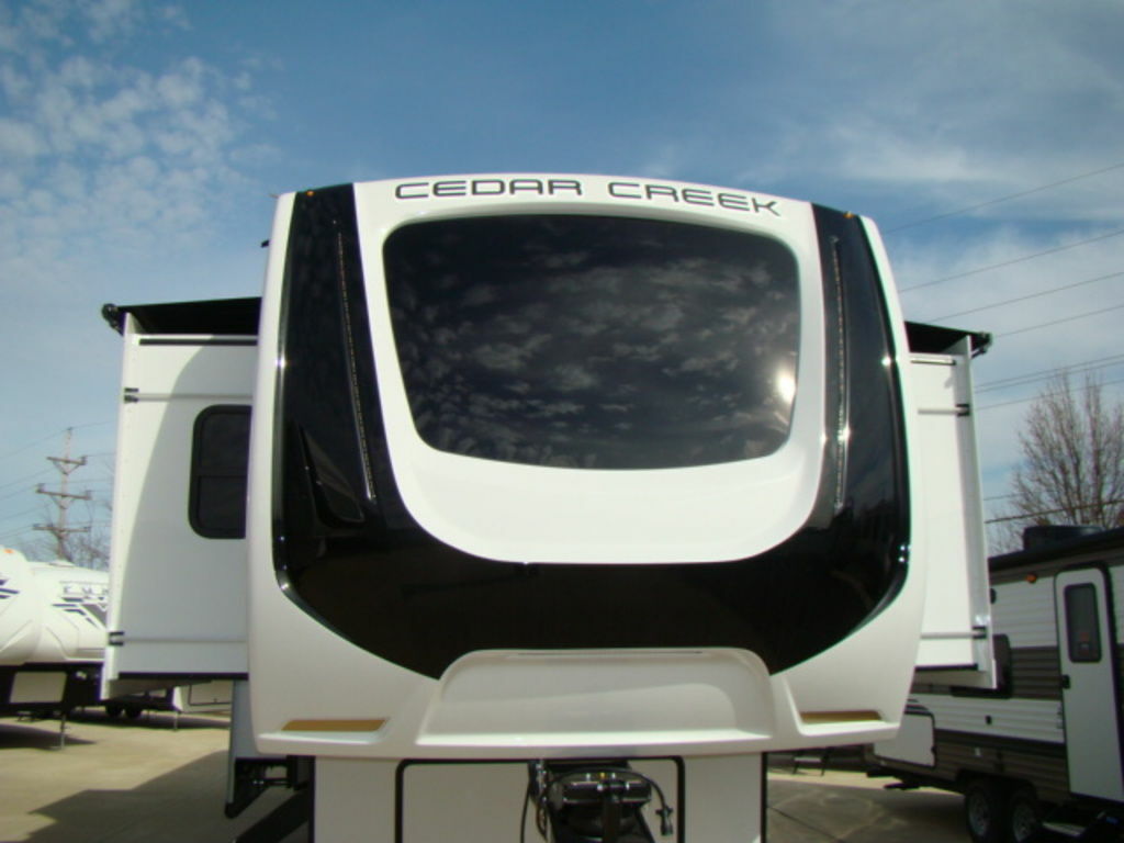 Front view of the New 2022 Forest River Cedar Creek 371FL Fifth Wheel RV.