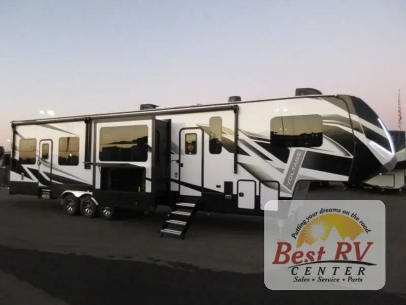 Side view of the New 2022 Dutchmen Rv Voltage 4135 Fifth Wheel Toy Hauler RV.