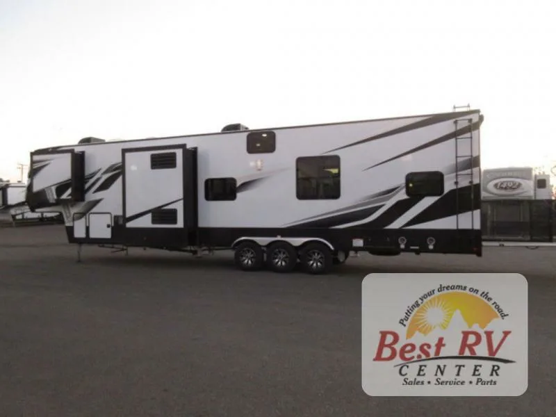 Side view of the New 2022 Dutchmen Rv Voltage 4135 Fifth Wheel Toy Hauler RV.