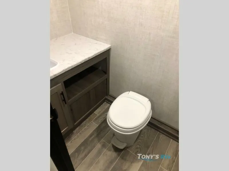 Bathroom with a sink and a toilet.