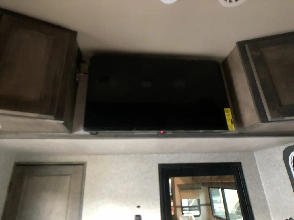 Living space with a wall-mounted TV