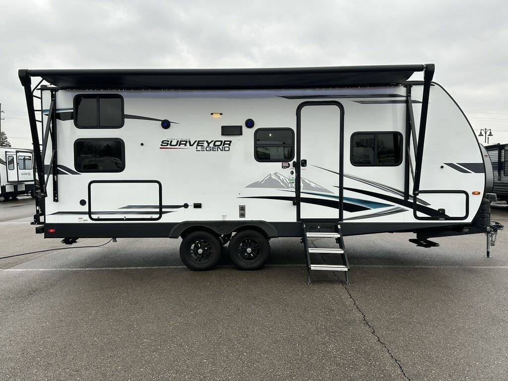 Side view of the New 2024 Forest River Surveyor Legend Murphy Bed 240BHLE Travel Trailer RV.