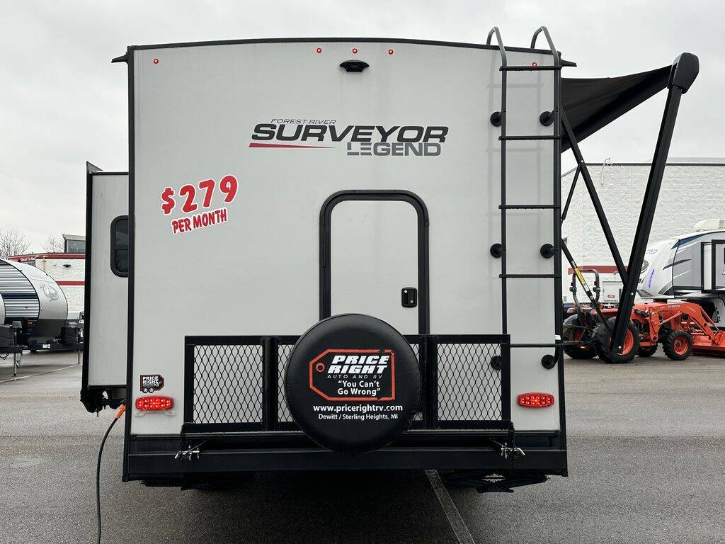 Rear view of the New 2024 Forest River Surveyor Legend Murphy Bed 240BHLE Travel Trailer RV.