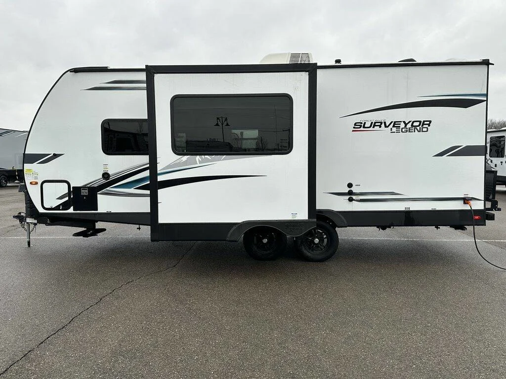 Side view of the New 2024 Forest River Surveyor Legend Murphy Bed 240BHLE Travel Trailer RV.