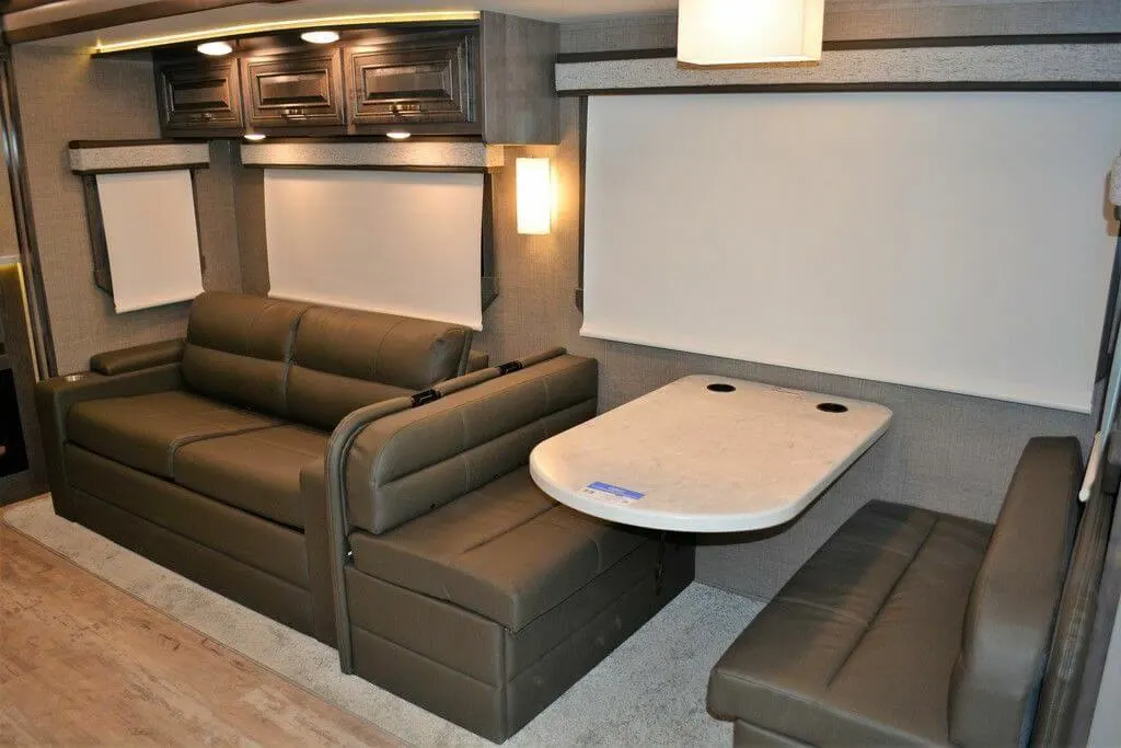 Booth dinette with a foldable table and banquette seats.