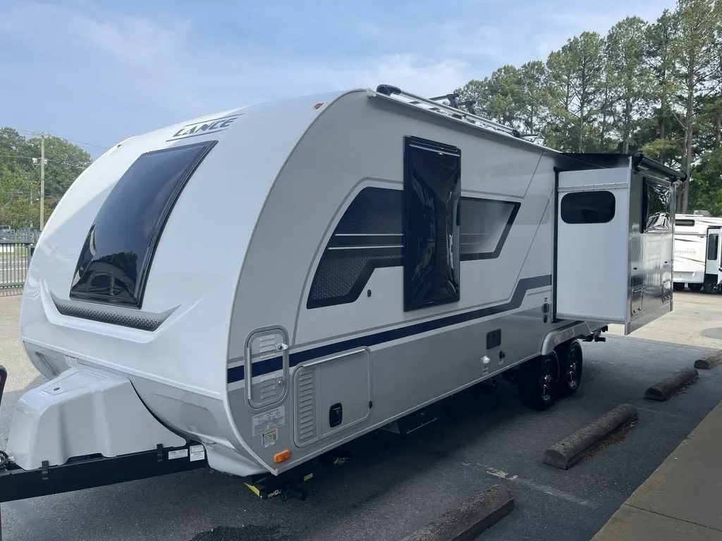 Side view of the New 2023 Lance Travel Trailer 2375 Travel Trailer RV.