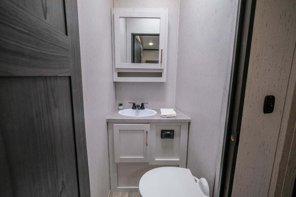 Bathroom with a sink and toilet.